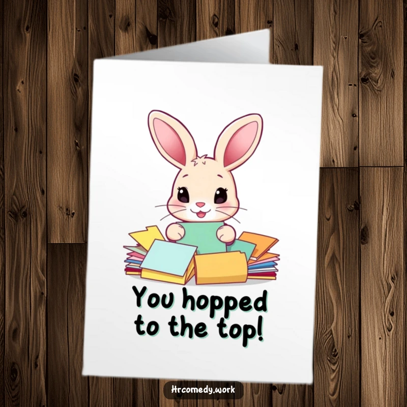 Free printable congratulations card: A comical rabbit with big ears sorts colorful papers, perfect for a funny celebratory message.